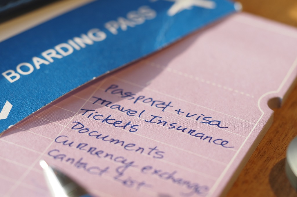 Travel document checklist with boarding pass and passport highlighting essential international travel requirements